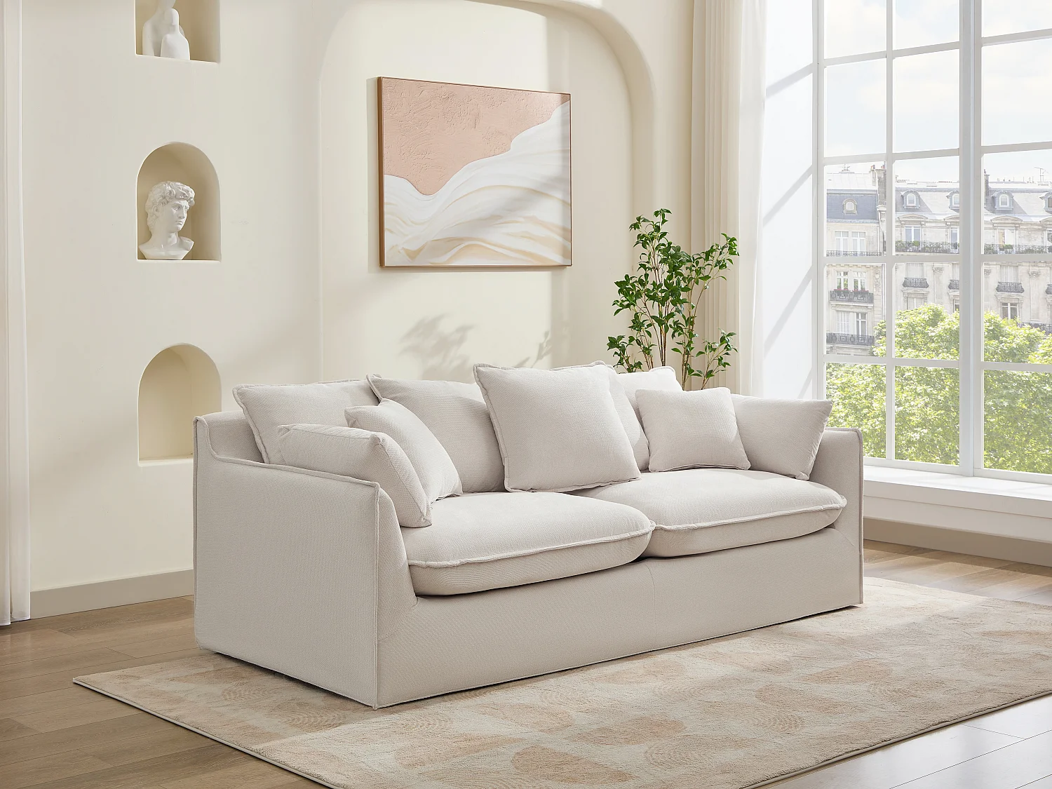 Driezitsbank van beige stof met extra kussens CABORNI