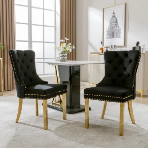 Eetkamerstoelset van 2, gestoffeerde stoel met spijkerkopafwerking, steunpoten van verguld roestvrij staal, fluweel, zwart/goud, met ronde trekringen Eetkamerstoelset van 2, gestoffeerde stoel met spijkerkopafwerking, steunpoten van verguld roestvrij staal, fluweel, zwart/goud, met ronde trekringen