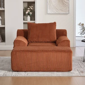 Fauteuil van corduroystof met beugel, zijzakken en kussens – oranje kleur Fauteuil van corduroystof met beugel, zijzakken en kussens – oranje kleur