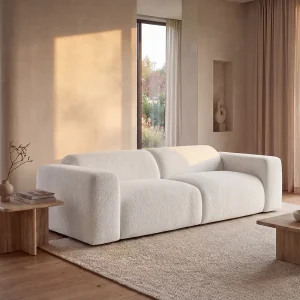 Driezitsbank van witte boucléstof met design-stijl POGNI van Maison Céphy Driezitsbank van witte boucléstof met design-stijl POGNI van Maison Céphy